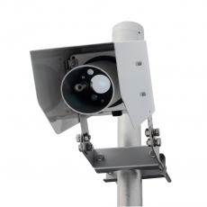 person using crane to move industrial gear box in engineering factory