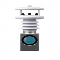 person using crane to move industrial gear box in engineering factory