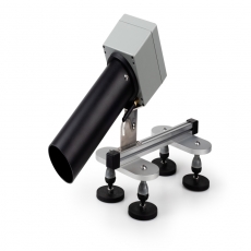 person using crane to move industrial gear box in engineering factory