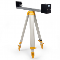 person using crane to move industrial gear box in engineering factory