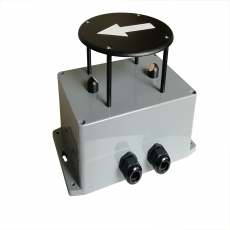 person using crane to move industrial gear box in engineering factory