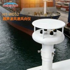 person using crane to move industrial gear box in engineering factory