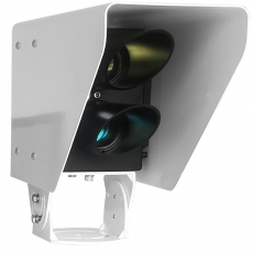 person using crane to move industrial gear box in engineering factory